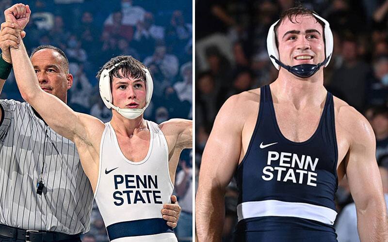 Drew Hildebrandt (Penn State) with arm raised; Max Dean (Penn State) smiles on the mat
