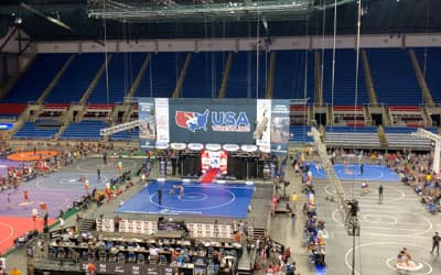 A view of mostly empty mats from the stands at the Fargodome.
