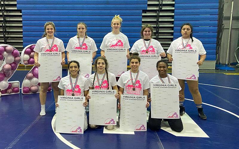 The 2022 Virginia girls state individual champions pose together with their bracket sheets