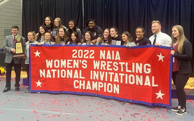 Campbellsville women's team poses together at the 2022 NAIA National Women's Invitational champions.