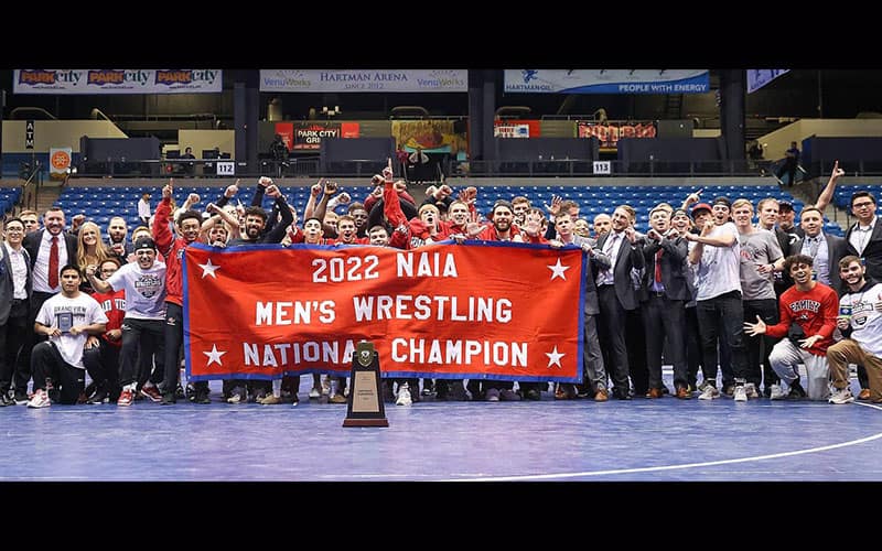 2022 NAIA National Champions Grand View poses with their trophy
