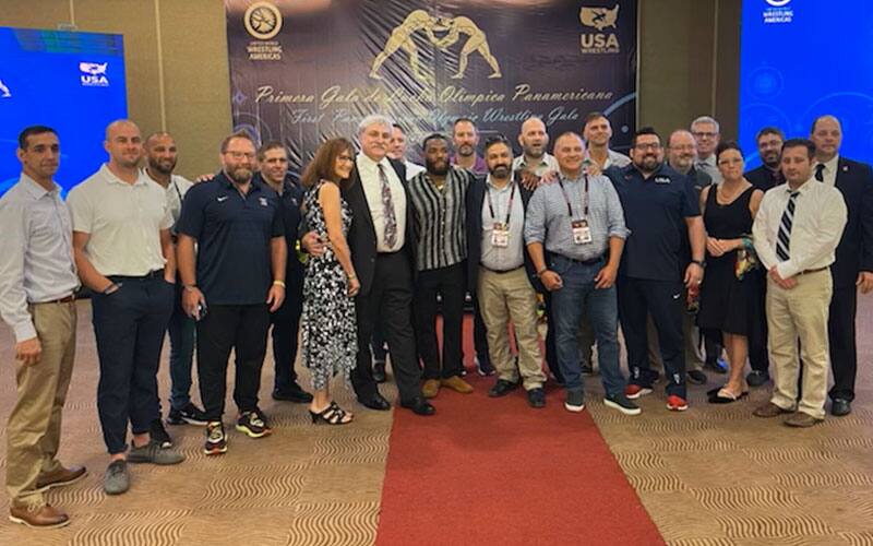 UWW Americas Award winners Bruce Baumgartner, Jordan Burroughs, Bill Zadick pose with friends and supporters.