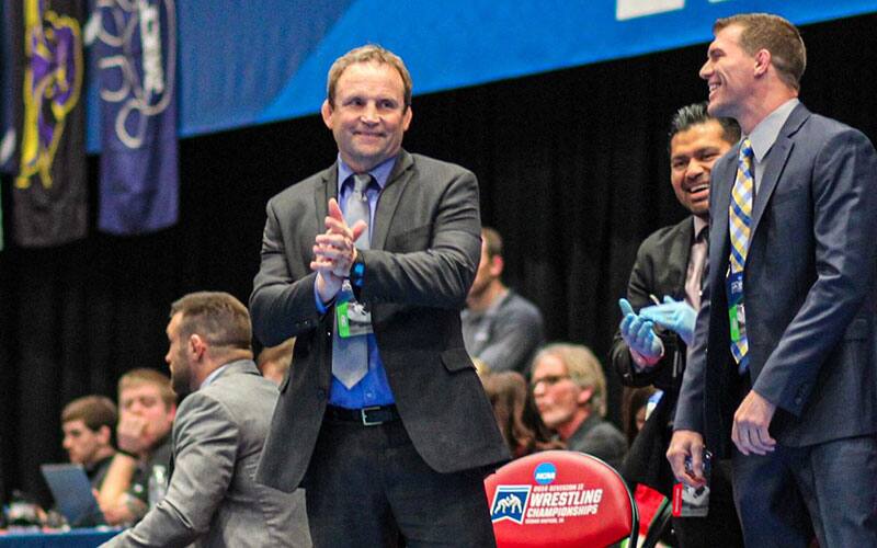 California Baptist Coach Lenny Zalesky with his staff at an event