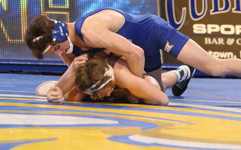 South Dakota State's Gabriel Tagg works on top in a match against a Missouri wrestler