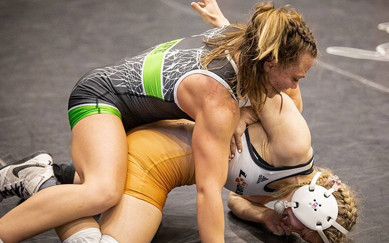 Julia Vidallon of Life controls an opponent from par terre