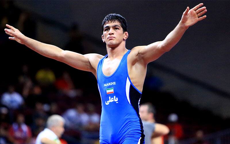 Hassan Yazdani Charati (IRI) waves to the crowd